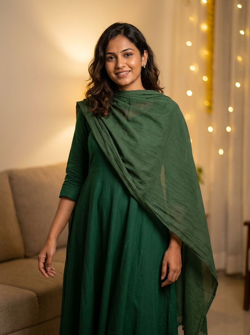Model in a plain green suit